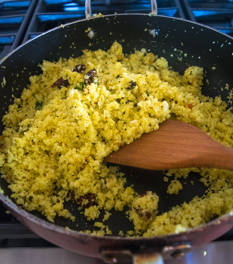 Quick 10-minute lemon cauliflower rice--Riced cauliflower tossed with aromatic Indian spices, so good you won't miss the rice! |www.cookeatlaugh.com