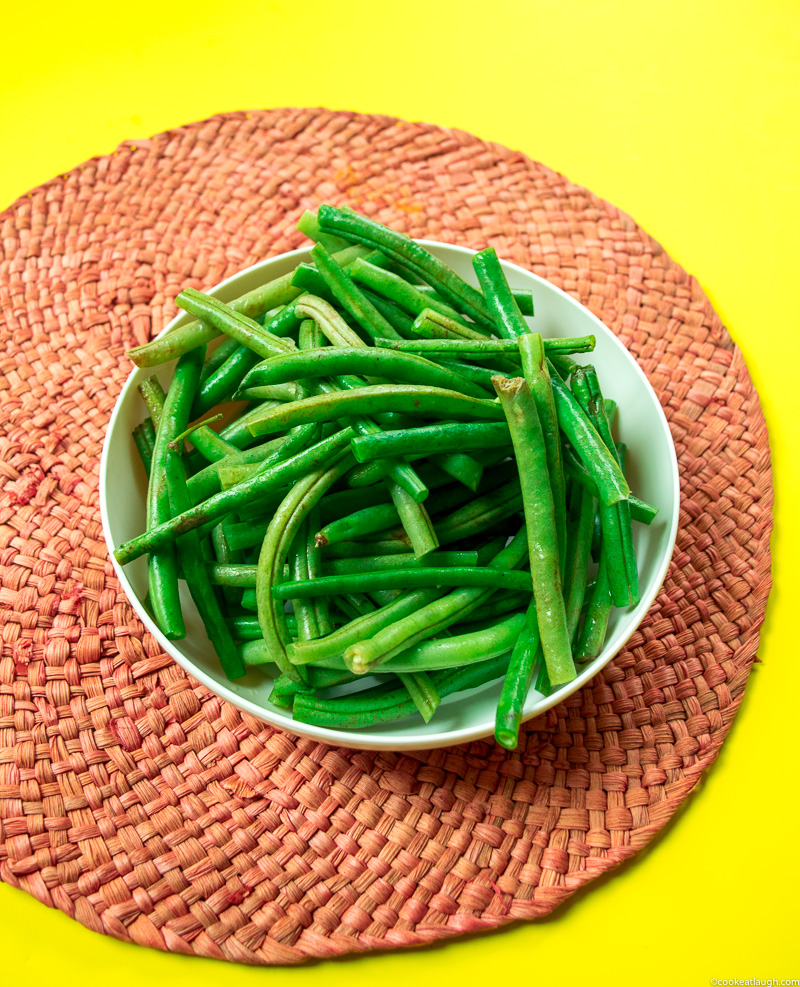 Sautéed green beans with toasted almonds—a simple elegant dish that will make a great side on your holiday table or for Sunday dinner. |www.cookeatlaugh.com--1